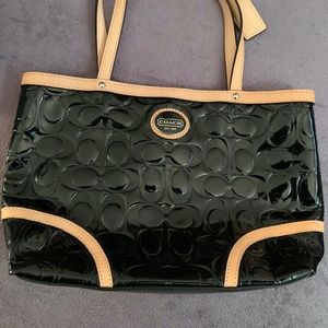 Coach mini tote with clasp closure